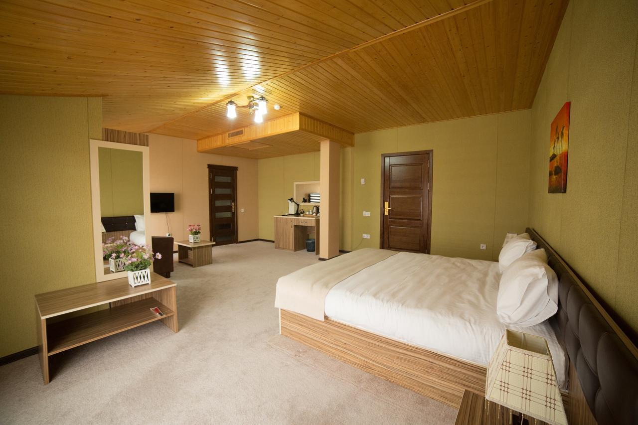 New City Hotel Masazir Room photo